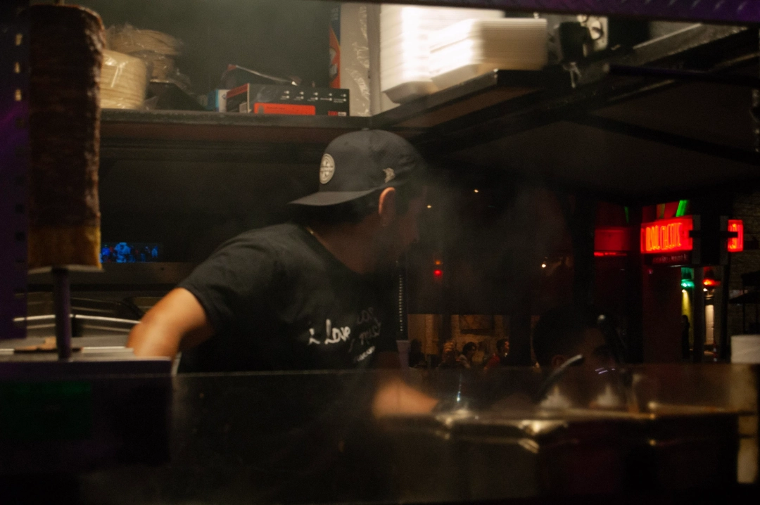 A cook in a food truck.