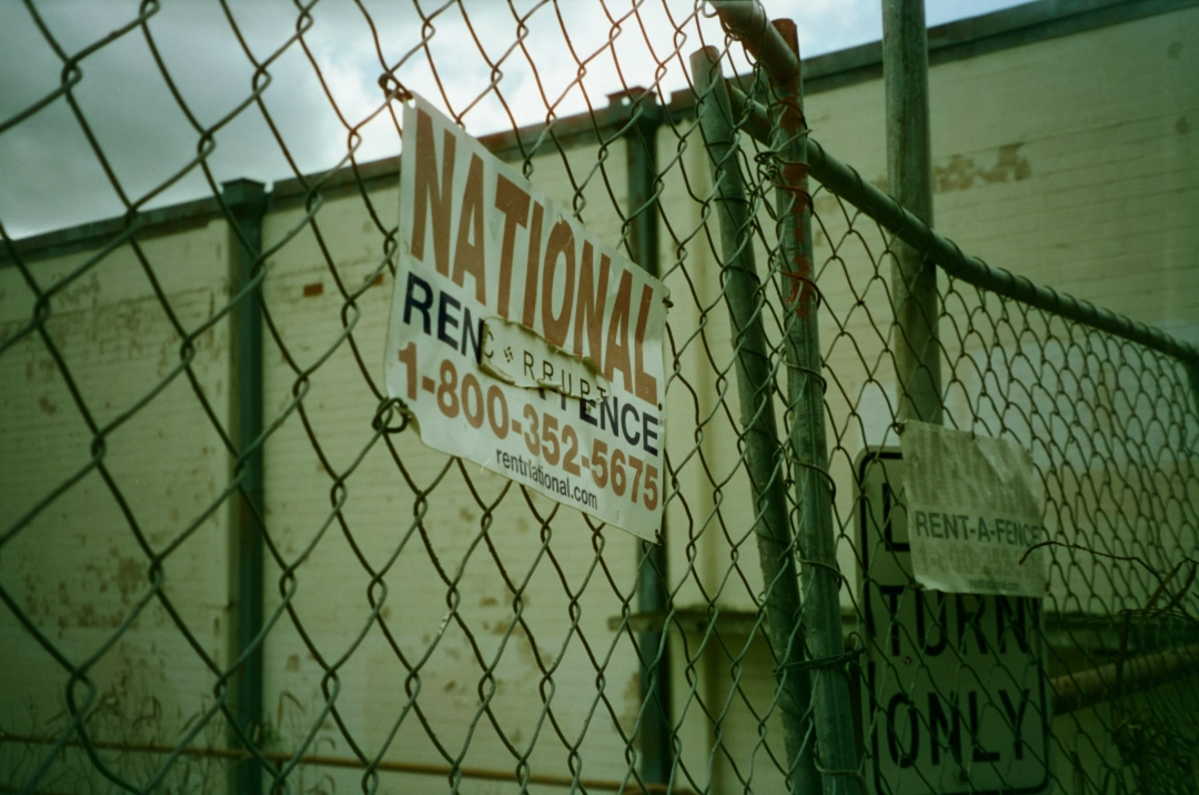 A fenced-off building.