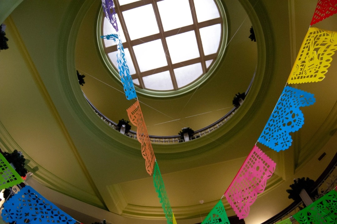 A skylight over crisscrossing streamers.